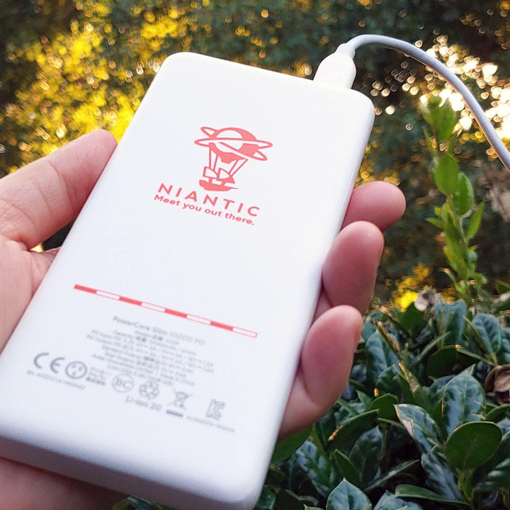 White Portable Battery Pack with Niantic Logo