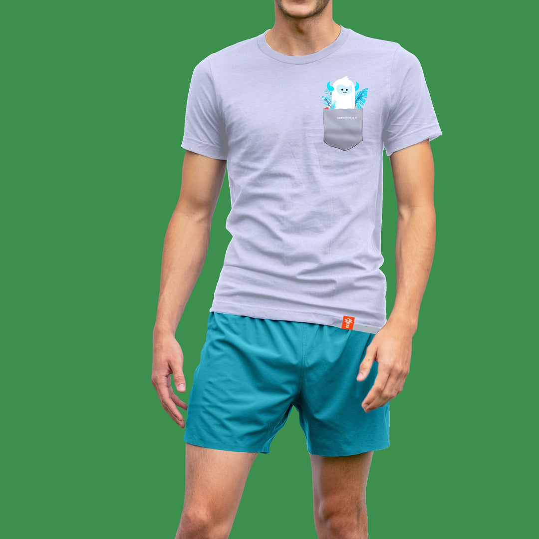 niantic having fun yeti pocket tee gray in front of green background